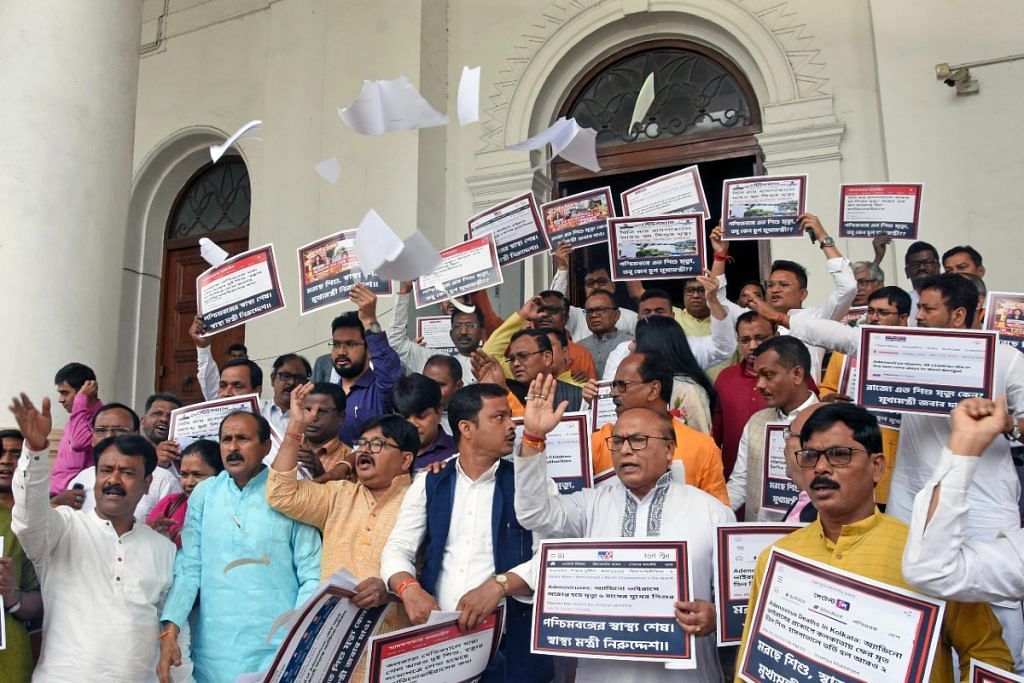 BJP MLAs protesting Bengal govt's handling of adenovirus cases on 9 March 2023 | ANI
