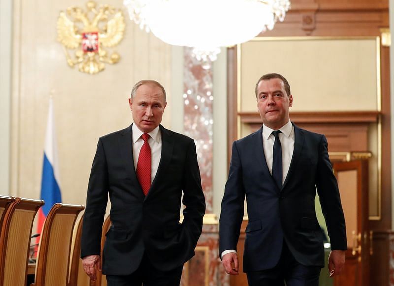 Russian President Vladimir Putin and former president Dmitry Medvedev | Sputnik/Dmitry Astakhov/Pool via Reuters