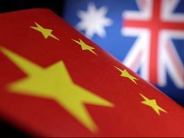 Printed Chinese and Australian flags are seen in this illustration | Reuters