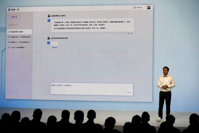 Baidu's co-founder and Chief Executive Officer Robin Li showcases artificial intelligence powered chatbot known as Ernie Bot by Baidu, during a news conference at the company's headquarters in Beijing on 16 March, 2023 | Reuters