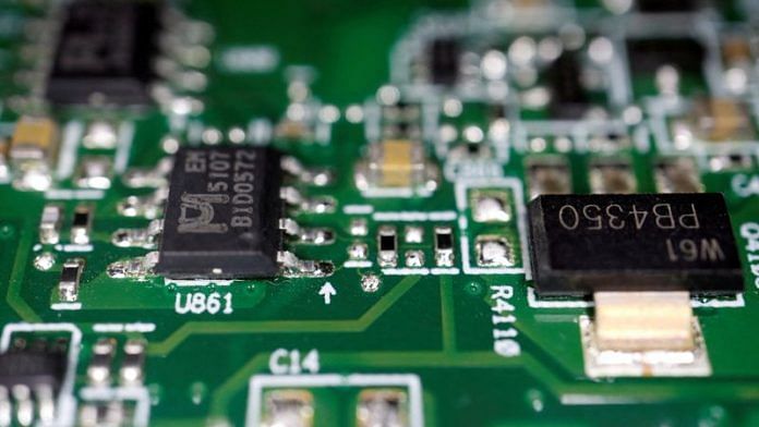 Semiconductor chips are seen on a printed circuit board in this illustration picture | Reuters