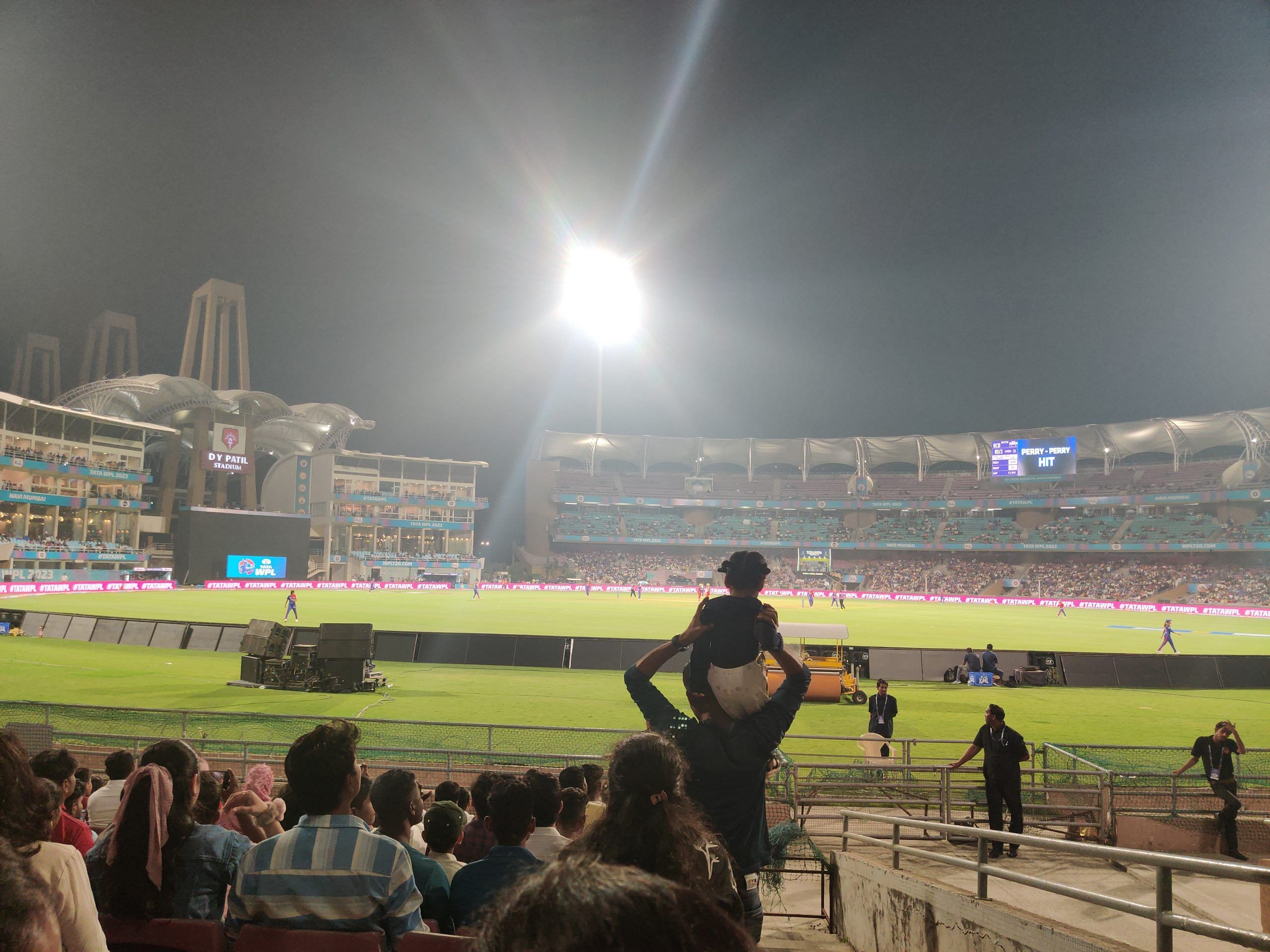Pihu, a toddler accompanied by her parents, perched atop her father's shoulders as crowd-favourite Jemimah Rodrigues comes close to the boundary to field | Nidhima Taneja | ThePrint