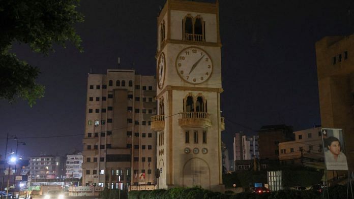 A car drives near a clock tower in Jdeideh, Lebanon 25 March, 2023 | Reuters