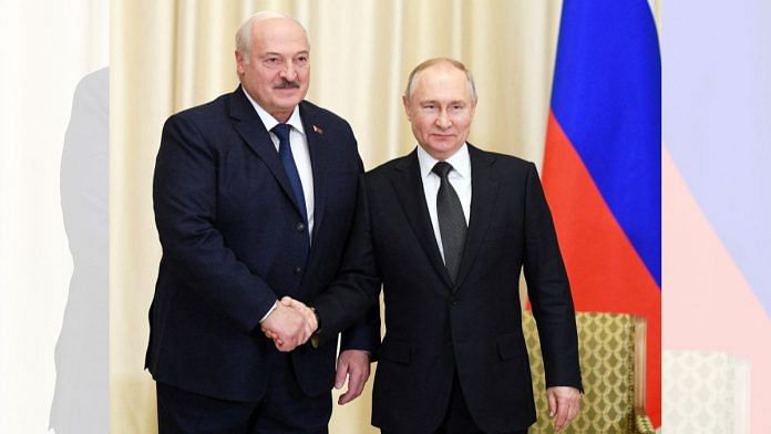 File photo of Russian President Vladimir Putin shaking hands with Belarusian President Alexander Lukashenko during a meeting at the Novo-Ogaryovo state residence outside Moscow, 17 February, 2023 | Reuters