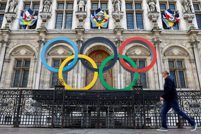 The Olympic rings are seen in front of the Hotel de Ville City Hall in Paris, France | File Photo: Reuters