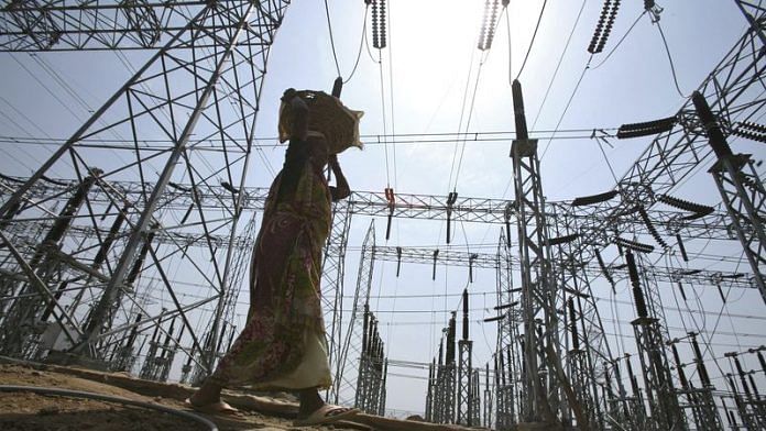 A labourer works at the construction site of a grid power station in Jammu | File Photo: Reuters