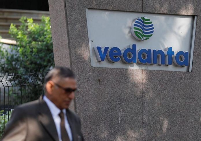A man walks past the logo of Vedanta outside its headquarters in Mumbai | Reuters file photo