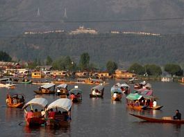 Tourists ride "Shikaras" or boats in the waters of Dal Lake in Srinagar | File Photo: Reuters