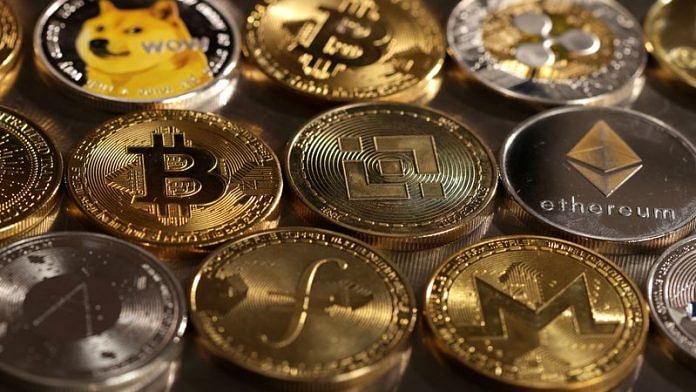Representations of cryptocurrencies are seen in this illustration | Reuters