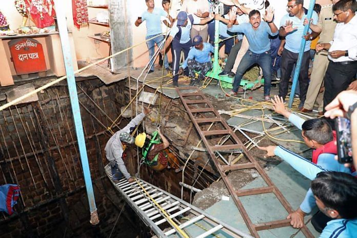 Rescue operations are being conducted for those trapped in the stepwell at a temple following its collapse, at Patel Nagar area, in Indore, on 30 March 2023 | ANI