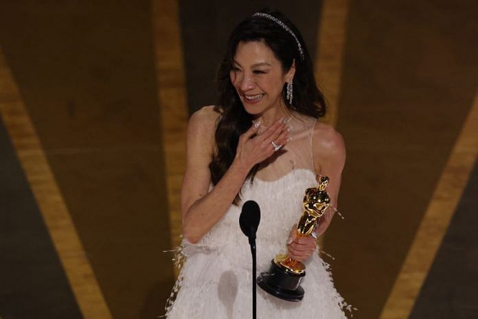 Michelle Yeoh receiving her Oscar for Best Actress at the 95th Academy Awards in Hollywood, Los Angeles, California | Reuters