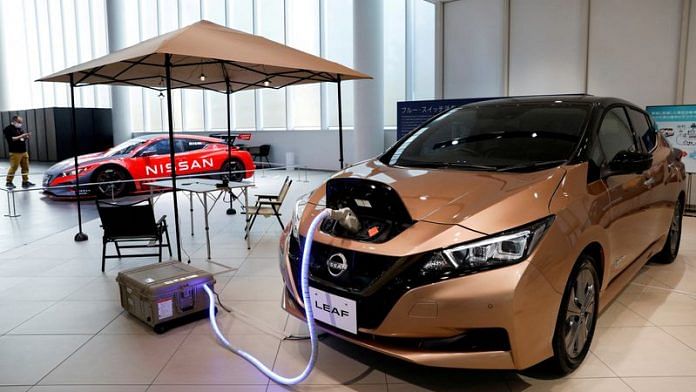 A Nissan Leaf EV car and portable battery on display at Nissan Gallery in Yokohama, Japan | File Photo: Reuters