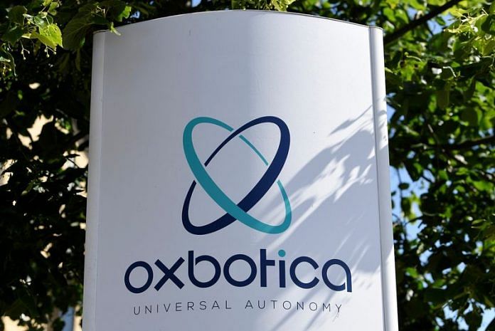 Signage is seen for Oxbotica, an autonomous vehicle technology tech firm, at their company headquarters in Oxford, Britain | File Photo: Reuters
