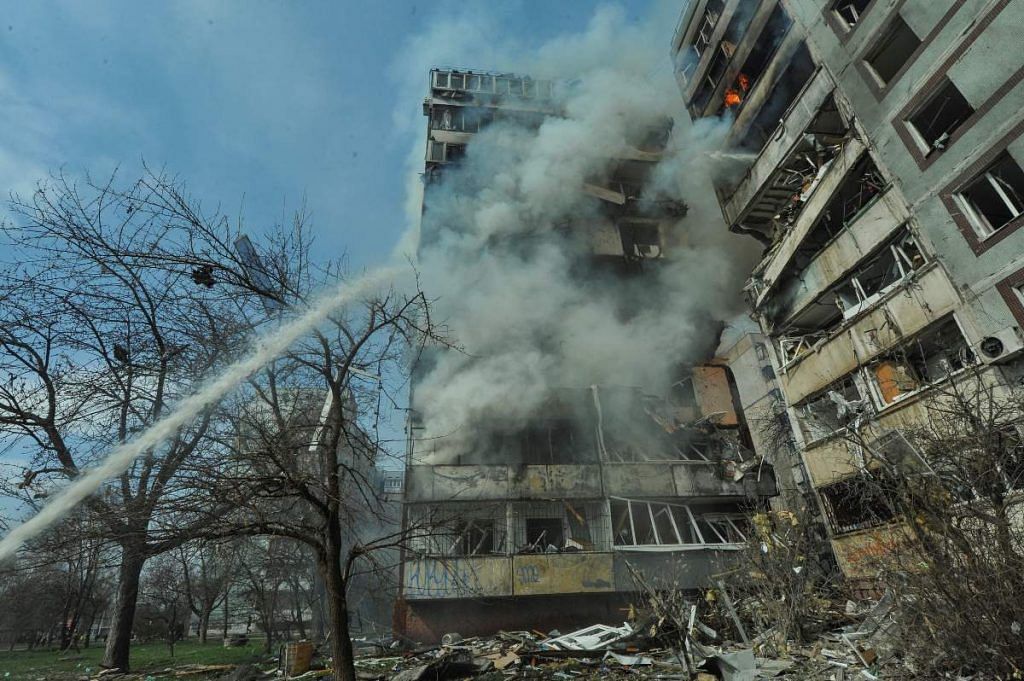 A view shows a residential building damaged by a Russian missile strike in Zaporizhzhia, Ukraine, on 22 March 2023 | Reuters