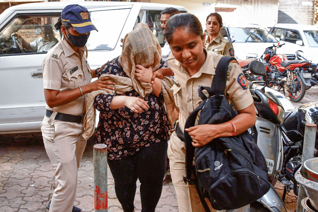 Police personnel with Anil Jaisinghani's daughter Anishka outside a court in Mumbai on Friday | PTI