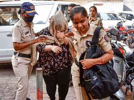 Police personnel with Anil Jaisinghani's daughter Anishka outside a court in Mumbai on Friday | PTI