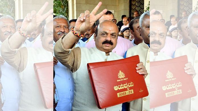 Karnataka CM Basavaraj Bommai shows the State Budget for the financial year 2023-24 prior to presenting it in the State Assembly, in Bengaluru on 17 February, 2022 | ANI