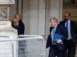 Former British Prime Minister Boris Johnson walks at the parliament in London, Britain, 22 March, 2023 | Reuters