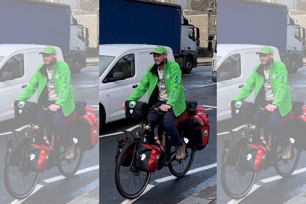 Rens Goede, gardener from Amsterdam, begins his 30,000 km (18,640 mile) bicycle trek from London to India in support of the "Save Soil" movement, in London on 22 March, 2023 | Reuters