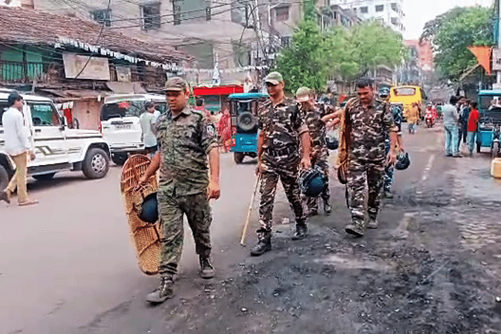 Paramilitary personnel patrol areas where arson occurred during ruckus while Rama Navami procession was underway in Howrah on Friday | ANI