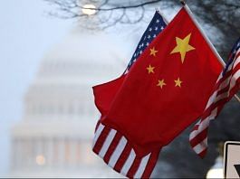 The People's Republic of China flag and the U.S. Stars and Stripes fly along Pennsylvania Avenue near the U.S. Capitol in Washington | File Photo: Reuters