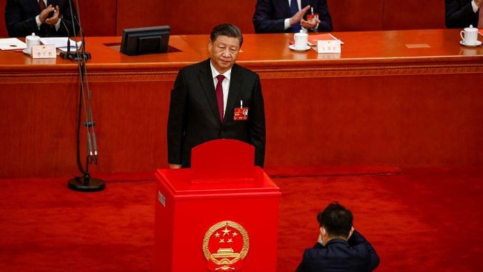 Chinese President Xi Jinping looks on after casting his vote during the Third Plenary Session of the National People's Congress (NPC) at the Great Hall of the People, in Beijing, China, 10 March 2023. MARK R. CRISTINO/Pool via REUTERS