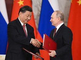 Russian President Vladimir Putin & Chinese President Xi Jinping at Kremlin in Moscow Tuesday | Reuters