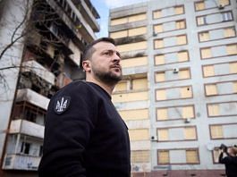 Ukraine's President Volodymyr Zelenskyy visits a site of residential buildings recently damaged by a Russian missile strike, amid Russia's attack on Ukraine, in Zaporizhzhia on 27 March, 2023 | Reuters
