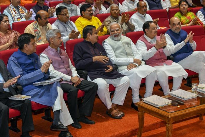Prime Minister Narendra Modi (in grey) with BJP MPs at the party parliamentary meeting in New Delhi, 28 March, 2023 | Photo: ANI
