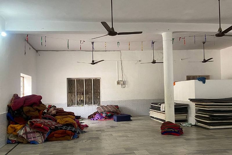 A pile of blankets and mattresses inside the centre | Photo: Ananya Bhardwaj | ThePrint