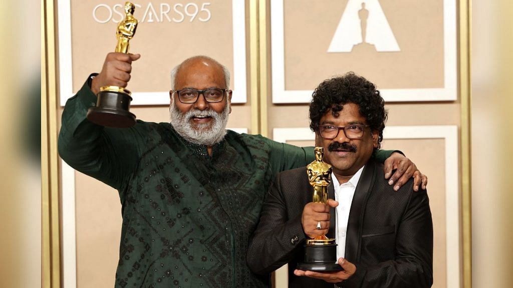 M.M. Keeravaani and Chandrabose pose with the Oscar for Best Original Song for "Naatu Naatu" from "RRR" in the Oscars photo room at the 95th Academy Awards in Hollywood, Los Angeles, California, U.S., March 12, 2023. REUTERS/Mike Blake