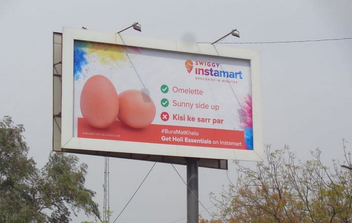 A billboard displaying the Swiggy advertisement