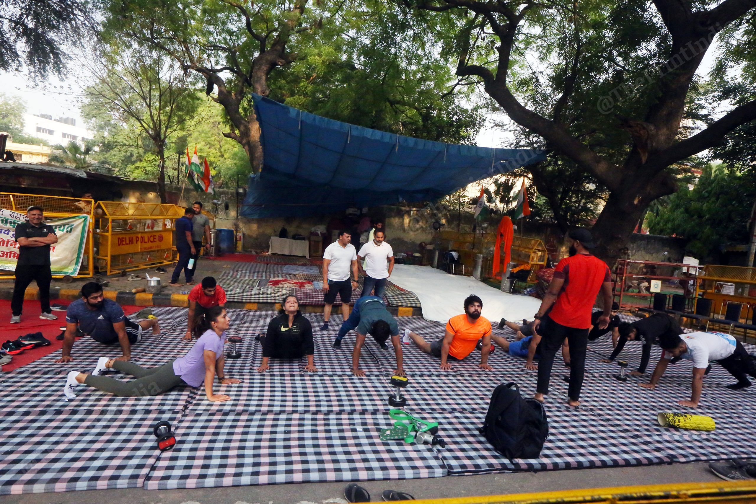 Athletes stretching as part of their daily training routine | Praveen Jain | ThePrint