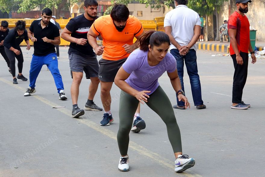 Vinesh Phogat and others during their morning fitness routine | Praveen Jain | ThePrint