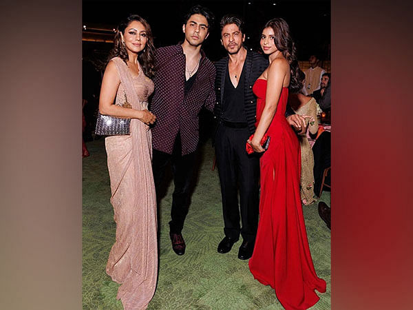 SRK strikes a pose with his wife, children at NMACC event