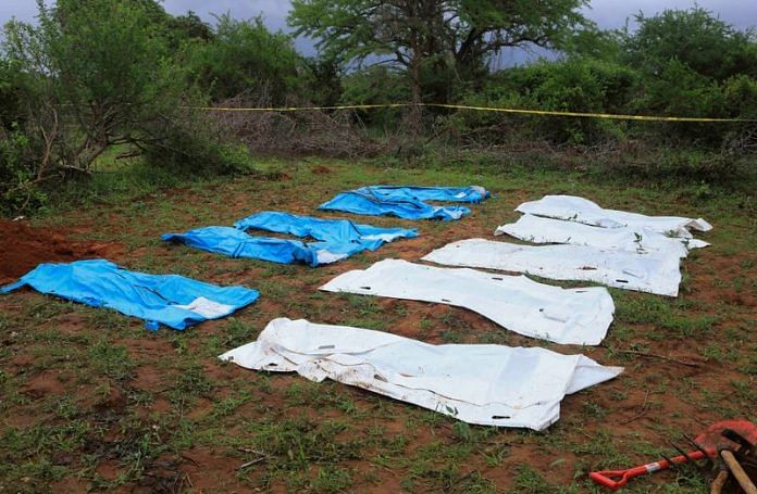 Body bags are seen arranged as forensic experts and homicide detectives exhume bodies of suspected members of a Christian cult in Shakahola forest of Kilifi county, Kenya | Reuters