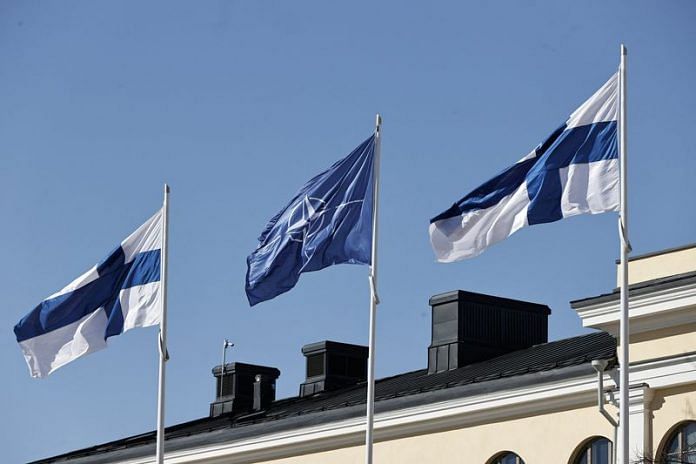 Finnish and Nato flags flutter at the courtyard of the Foreign Ministry in Helsinki on 4 April 2023 | Photo: Reuters