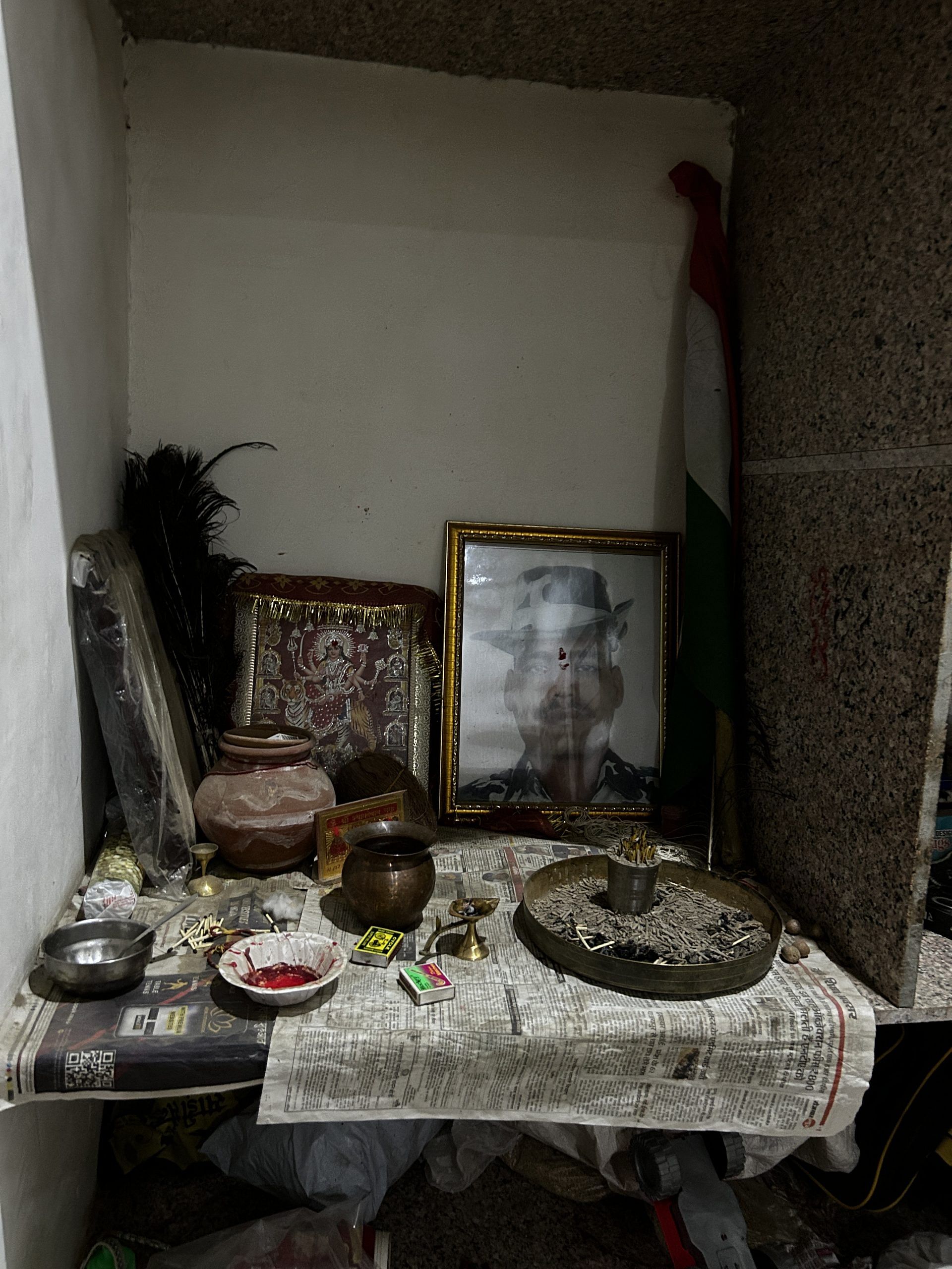 Rohitash Lamba’s photo placed along with the Gods in Manju’s house. She lives in a rented house, on the outskirts of Jaipur | Jyoti Yadav, ThePrint