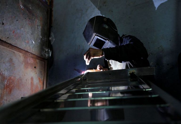 India’s factory activity hits 3-month high in March, but job cuts resume