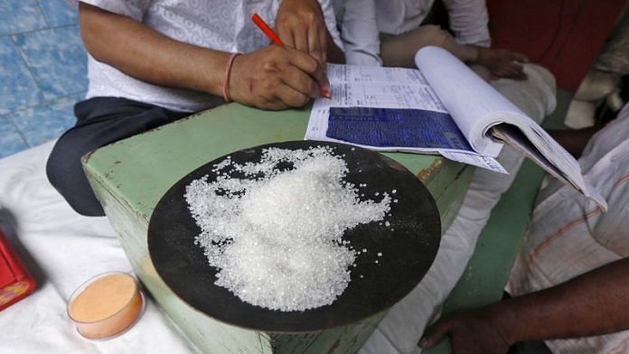 A sample of sugar crystals are seen on the desk of a trader at a wholesale market in Kolkata | File Photo: Reuters