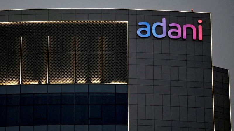 The logo of the Adani group seen on the facade of one of its buildings on the outskirts of Ahmedabad | Photo: Reuters File Photo