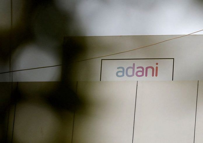 The logo of the Adani Group is seen on one of its buildings in Ahmedabad | Reuters