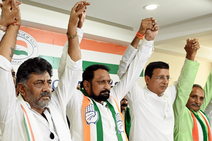 Former BJP leader and former Karnataka deputy chief minister Laxman Savadi (centre) joins the Congress at the party office in Bengaluru on Friday | ANI