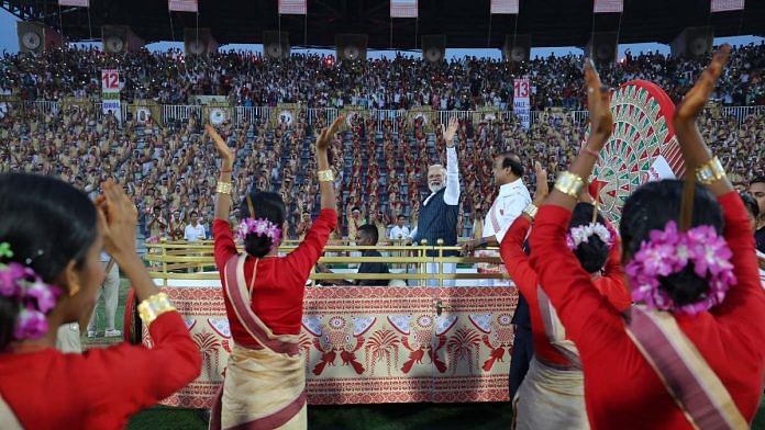PM Narendra Modi is greeted by Bihu performers at the Sarusajai stadium in Guwahati | Twitter | @NarendraModi