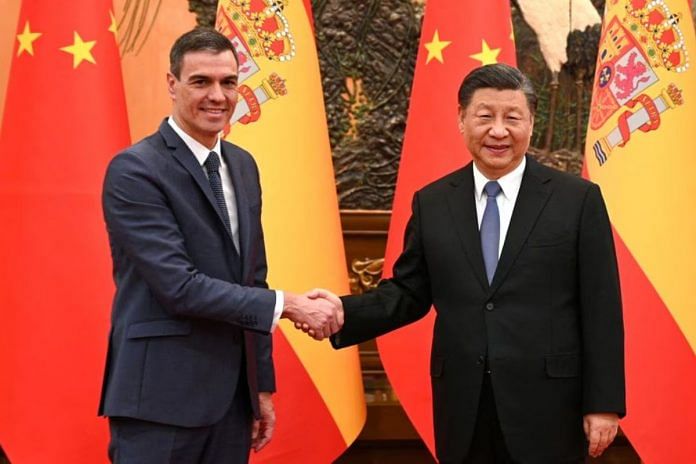 Chinese President Xi Jinping and Spanish Prime Minister Pedro Sanchez shake hands in Beijing, China, March 31, 2023. Moncloa Palace/Borja Puig de la Bellacasa/Handout via REUTERS