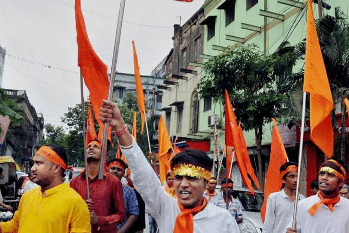 Devotees participate in a procession to celebrate ‘Ram Navami Festival’ in Kolkata on Wednesday. (Source: PTI)