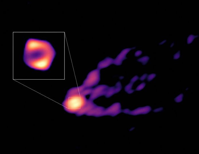 This image shows the jet and shadow of the black hole at the center of the M87 galaxy together for the first time | NRAO/AUI/NSF/Handout via Reuters
