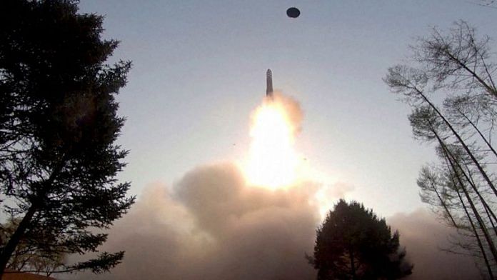 A view of a test launch of a new solid-fuel intercontinental ballistic missile (ICBM) Hwasong-18 at an undisclosed location | KCNA/via Reuters