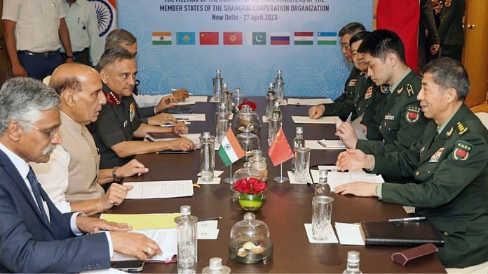 Defence minister Rajnath Singh with his Chinese counterpart Li Shangfu during a meeting on the sidelines of SCO Defence Ministers' meeting, in New Delhi, Thursday | ANI