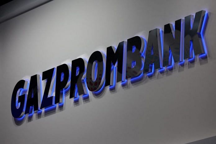A view shows a board with the logo of Gazprombank at the St. Petersburg International Economic Forum (SPIEF) in Saint Petersburg, Russia | Reuters file photo